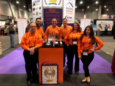 Kevins Worldwide personnel at trade show